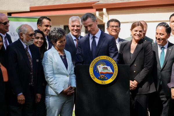 Gov. Gavin Newsom signs CARE (Community Assistance, Recovery, and Empowerment) Court into law alongside state and local leaders and stakeholders in San Jose, Calif., on Sept. 14, 2022. (Courtesy of Office of Governor Gavin Newsom)