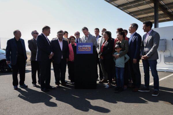 Gov. Gavin Newsom signs several new climate bills alongside several state legislators at the U.S. Department of Agriculture Forest Service Regional Office on Mare Island, a facility powered by green energy in Vallejo, Calif., on Sept. 16, 2022. (Courtesy of the Office of Governor Gavin Newsom)