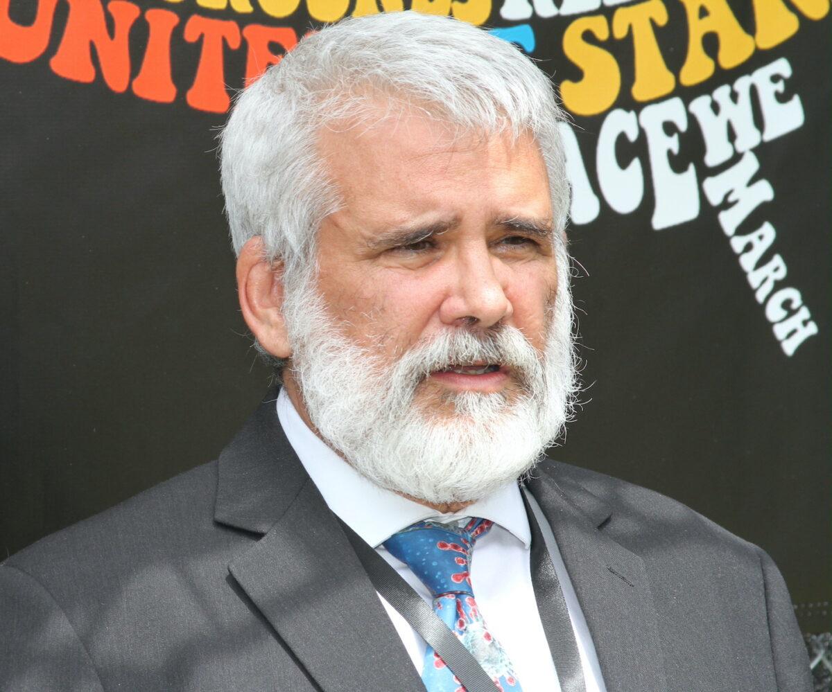 Dr. Robert Malone, who conducted key research on mRNA vaccines, speaks at the Defeat the Mandates rally in Los Angeles on April 10, 2022. (Brad Jones/The Epoch Times)