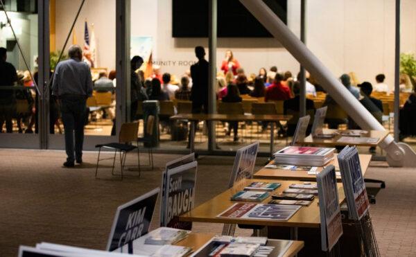 A crowd listens to candidates at City Hall in Newport Beach, Calif., on Oct. 12, 2022. (John Fredricks/The Epoch Times)