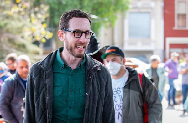 California Sen. Scott Wiener (D-San Francisco) talks with city officials in San Francisco, Calif., on Oct. 22, 2022. (John Fredricks/The Epoch Times)