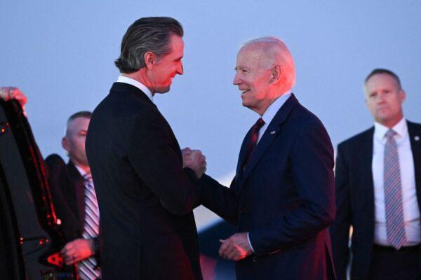 US President Joe Biden is greeted by California Gov. Gavin Newsom as he disembarks from Air Force One upon arrival at Marine Corps Air Station Miramar in San Diego, on Nov. 3, 2022. (Saul Loeb/AFP via Getty Images)