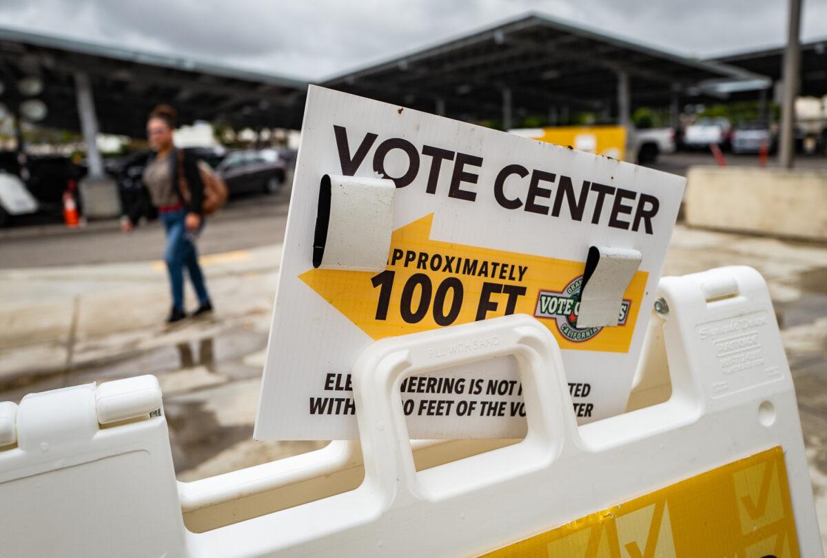 Voters drop off ballots at the Orange County Registrar of Voters offices in Santa Ana, Calif., on Nov. 8, 2022. (John Fredricks/The Epoch Times)