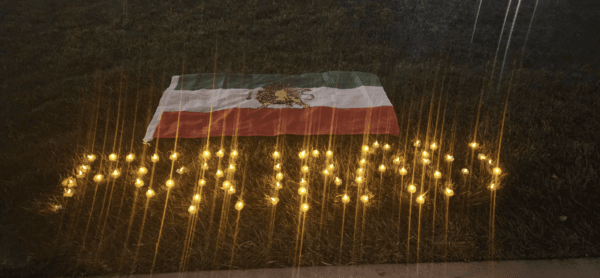 Candlelight Vigil held near Irvine Spectrum Center in memory of 9-year-old Kian Pirfalak, who was recently shot and killed in Iran amid conflicts between protesters and government forces, in Irvine, Calif., on Nov. 17, 2022. (Courtesy of Sudi Farokhnia)