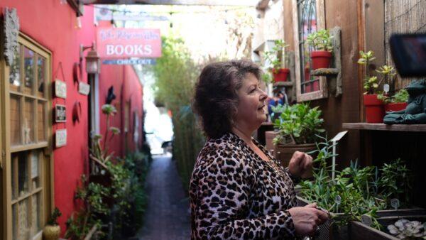 Cynthia Fernandes works in the garden in Carmel, Calif., on Oct. 18, 2022. (David Lam/NTD)