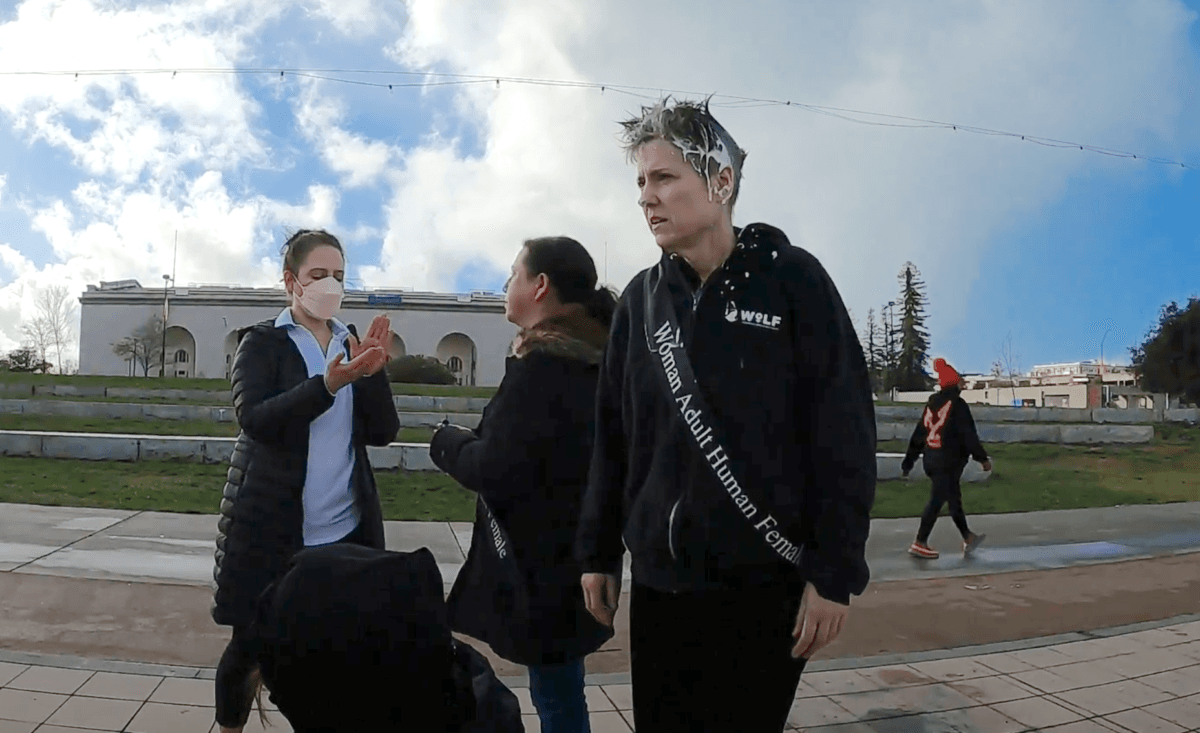Women protesting the possible transfer of convicted killer Dana Rivers—a biological man who identifies as female—to a women’s prison were attacked outside of the Alameda County Superior Courthouse in Oakland, Calif., on Dec. 5, 2022. (Courtesy of Women's Declaration International, U.S.A.)