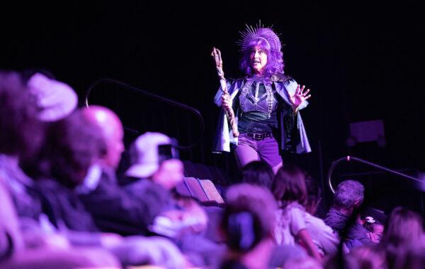 Children watch "The Journey Home" play as a part of the seasonal "Winter Lights Festival" exhibition at the Discovery Cube children's science museum in Santa Ana, Calif., on Dec. 16, 2022. (John Fredricks/The Epoch Times)