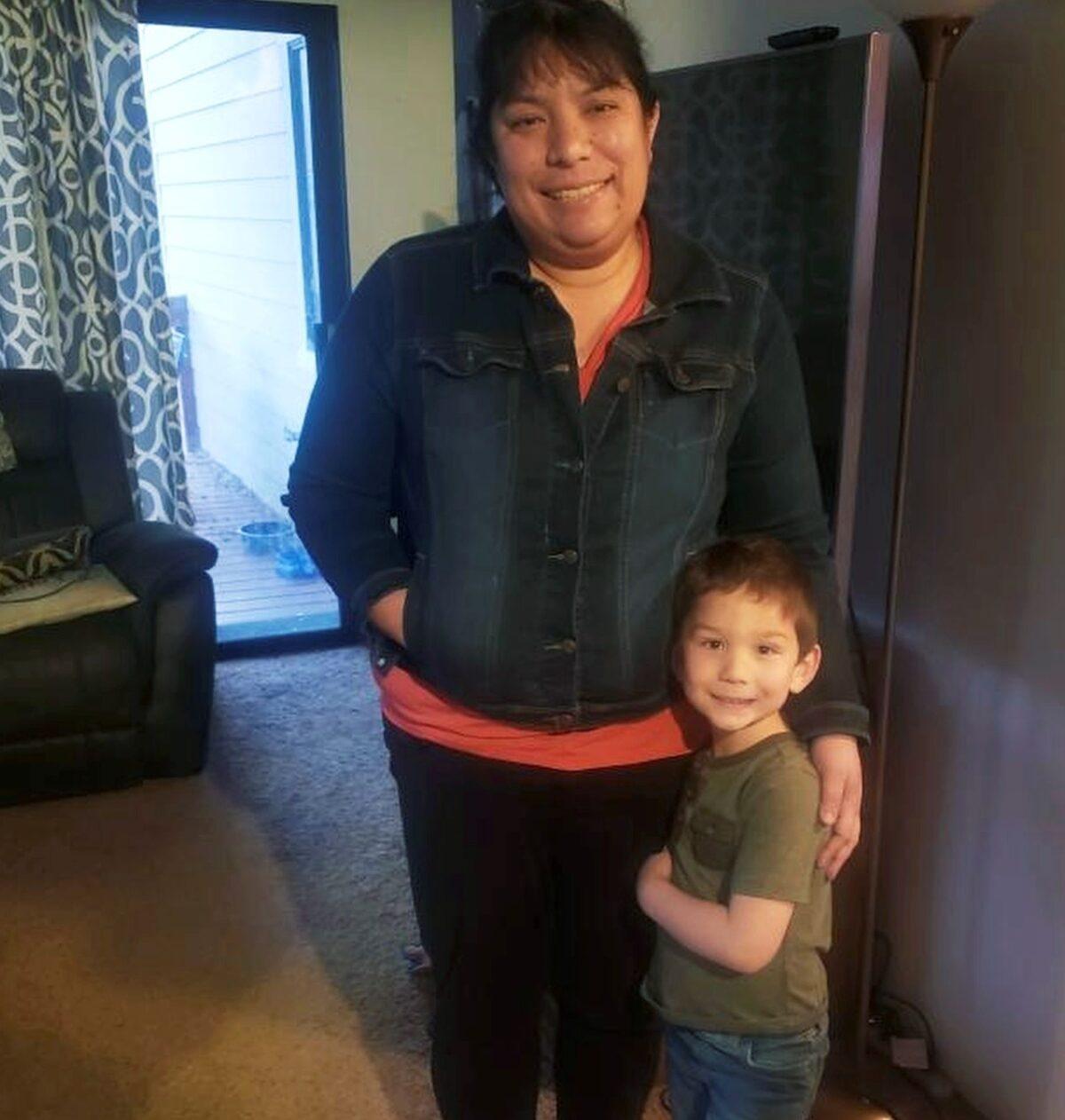Kyle Doan poses with his mother, Lindsy Doan. (Courtesy of the Doan Family via AP)