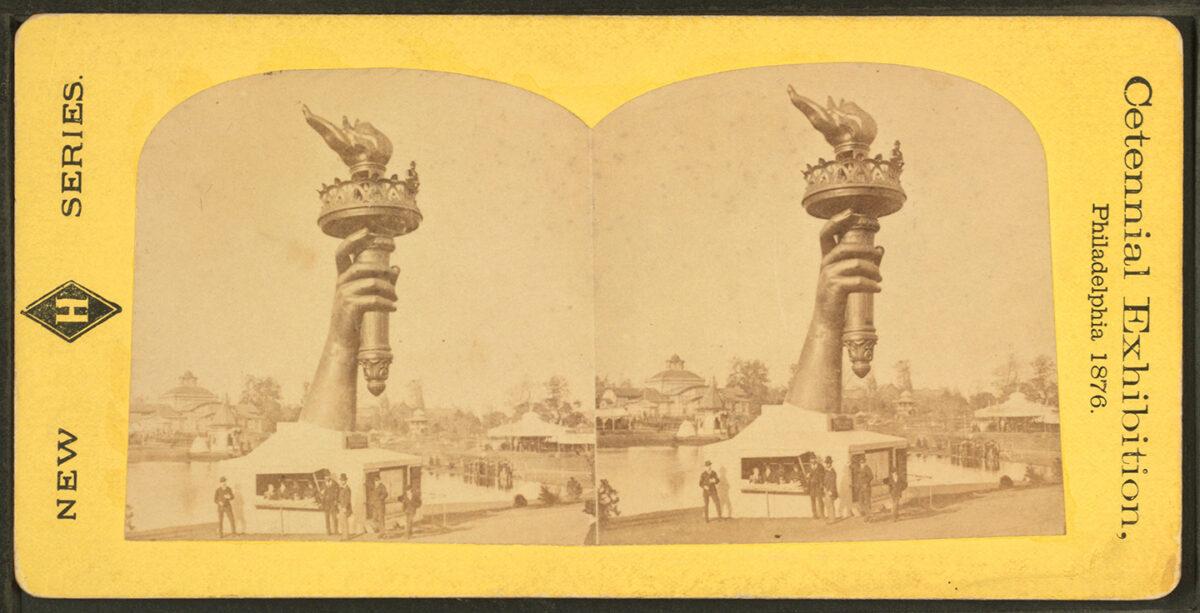 Stereoscopic image of right arm and torch of the Statue of Liberty, 1876 Centennial Exposition. (Public Domain)