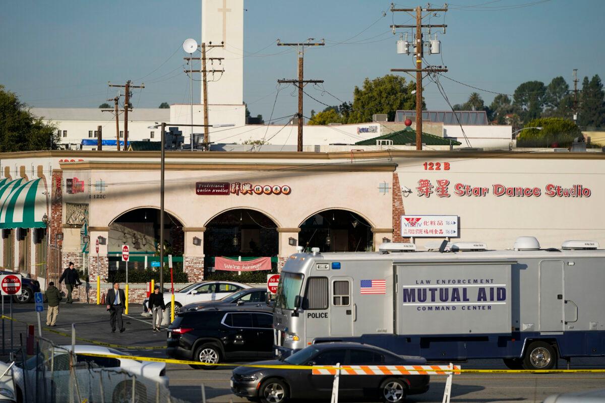 Investigators are seen outside Star Dance Studio in Monterey Park, Calif., on Jan. 22, 2023. (Jae C. Hong/AP Photo)
