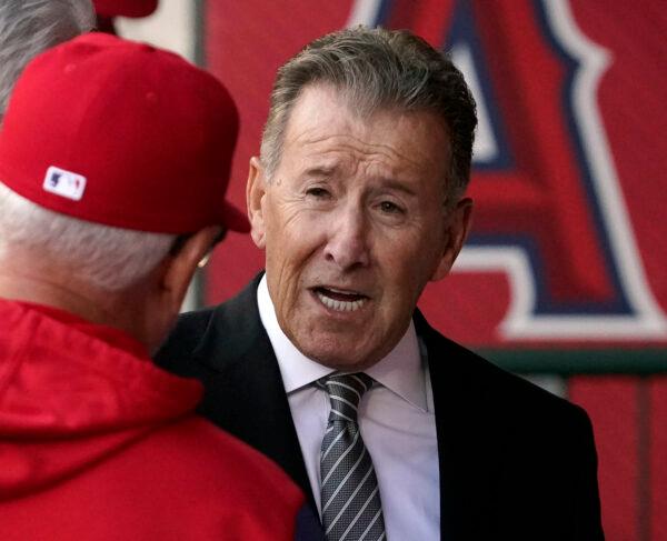 Los Angeles Angels owner Arte Moreno, right, talks with Angels manager Joe Maddon prior to a baseball game against the Cleveland Guardians, in Anaheim, Calif. on April 26, 2022. (Mark J. Terrill/AP Photo)