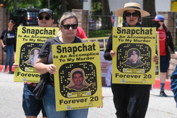 People opposed to the sale of illegal drugs on Snapchat participate in a rally outside the company's headquarters to call for tighter restrictions on the popular social media app following fatal overdoses of the powerful opioid fentanyl in Santa Monica, Calif., June 13, 2022. (Ringo Chiu/AFP via Getty Images)