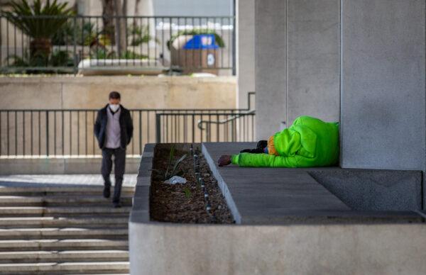 A homeless individual in Los Angeles on Jan 27, 2023. (John Fredricks/The Epoch Times)