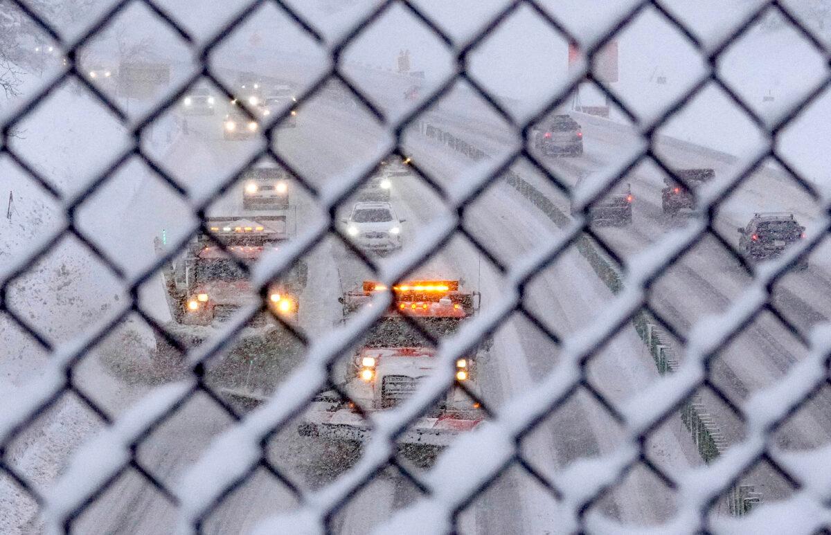 Snow plows clear the highway along Interstate 80 in Salt Lake City, Utah, on Feb. 22, 2023. (Francisco Kjolseth /The Salt Lake Tribune via AP)