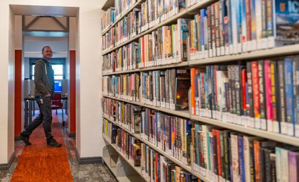A man walks through the San Juan Capistrano Library in San Juan Capistrano, Calif., on March 7, 2023. (John Fredricks/The Epoch Times)