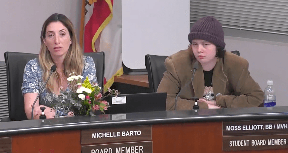 Board member Michelle Barto and a transgender student board member attend a Newport-Mesa Unified School District board meeting in Costa Mesa, Calif., on March 28, 2023. (Screenshot via Newport-Mesa Unified School District)