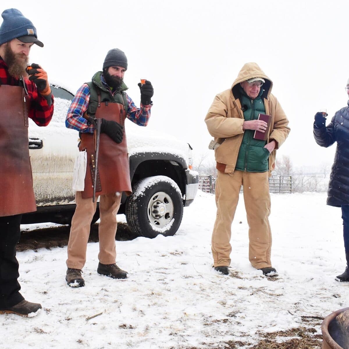 Poet, novelist, and environmentalist Wendell Berry (R) attends a hog butchering held by Hand Hewn Farm. (Courtesy of Hand Hewn Farm)