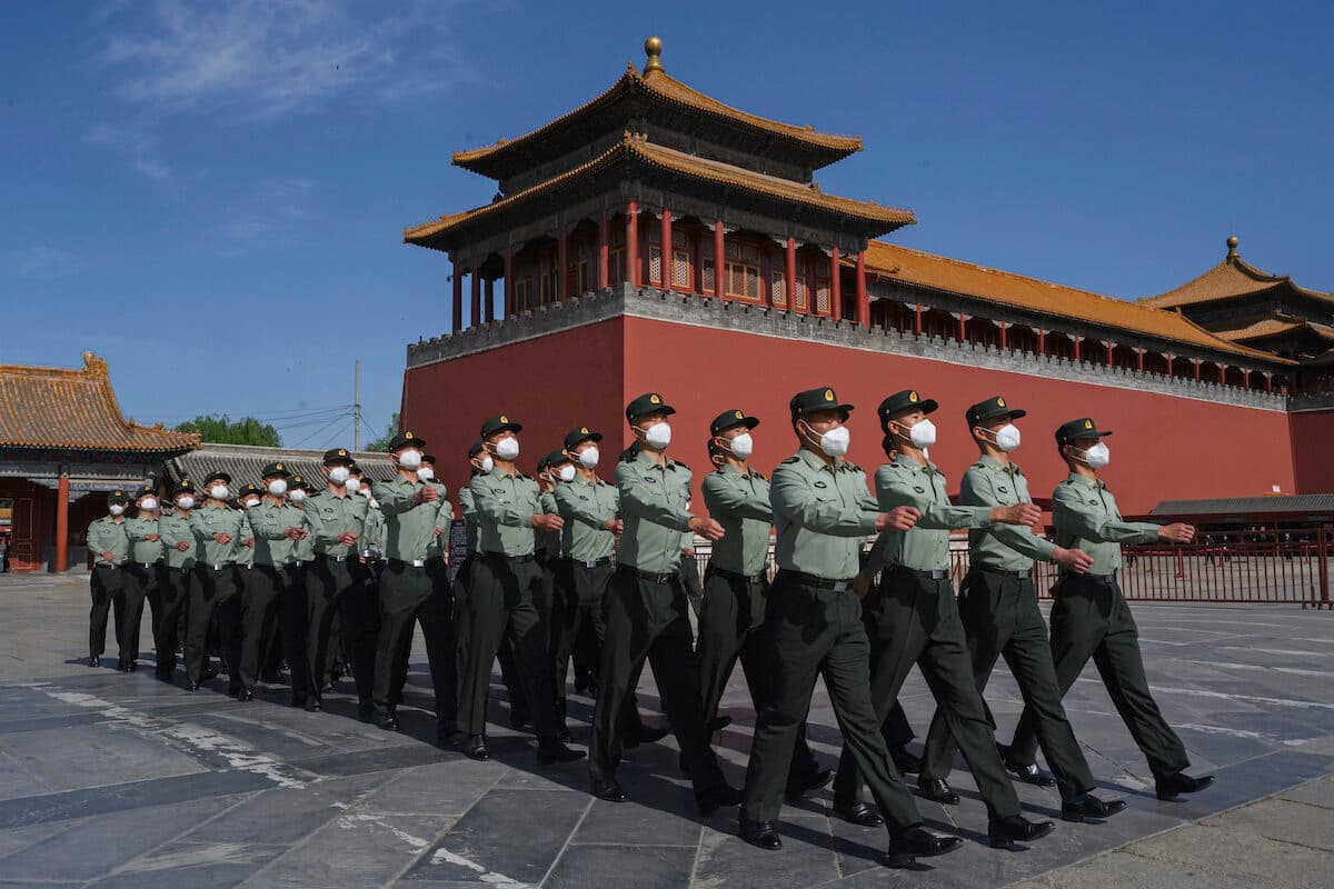 Soldiers of the People's Liberation Army's Honour Guard Battalion march outside the Forbidden City, near Tiananmen Square, in Beijing, on May 20, 2020. (Kevin Frayer/Getty Images)