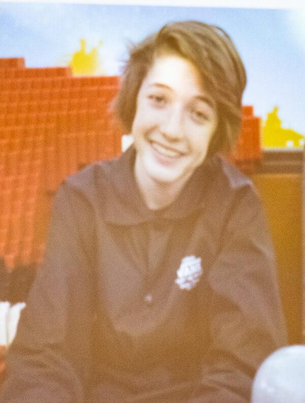 A projected photograph of Alexander Neville is displayed at a town hall meeting on Fentanyl in Laguna Niguel, Calif., on April 12, 2023. (John Fredricks/The Epoch Times