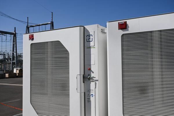 Battery storage boxes stand adjacent to the AES Alamitos Battery Energy Storage System in Long Beach, Calif., on Sept. 16, 2022. (Patrick T Fallon/AFP via Getty Images)