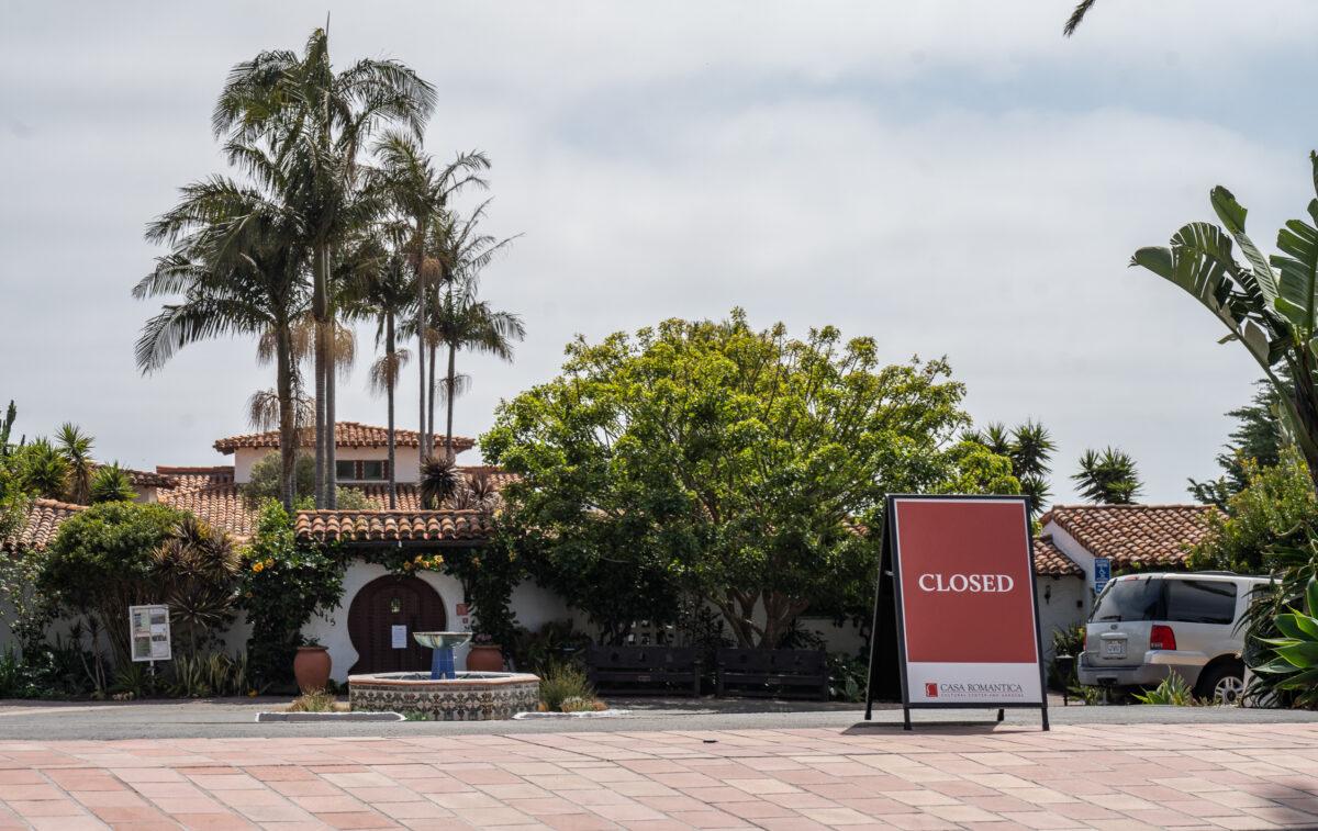 A closed sign is shown after a landslide hit Casa Romantica in San Clemente, Calif., on April 28, 2023. (John Fredricks/The Epoch Times)