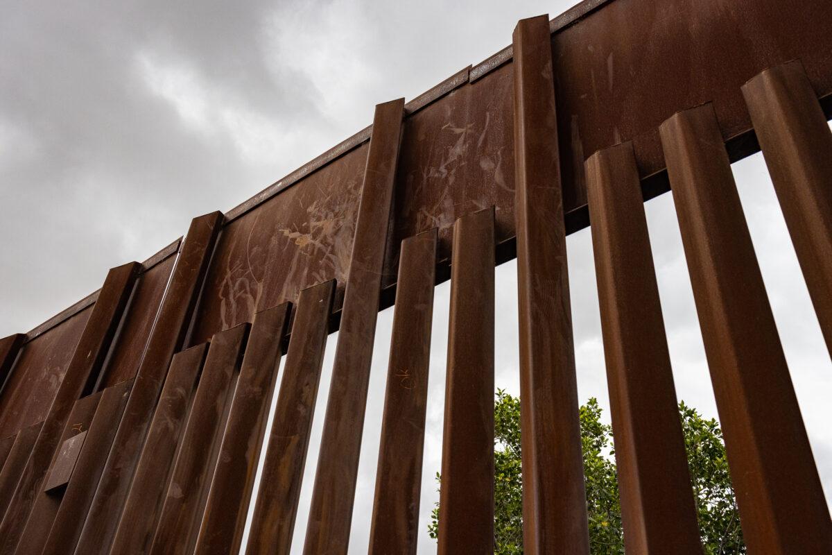 Handprints show an illegal border crossing near San Diego, Calif., on May 31, 2023. (John Fredricks/The Epoch Times)