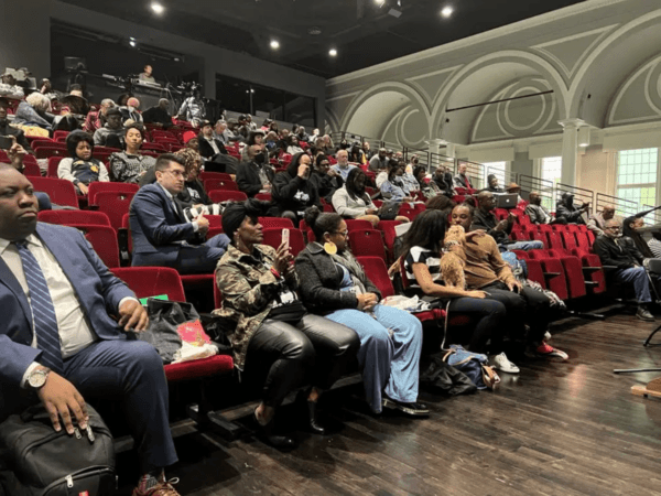 People listen to the California reparations task force, a nine-member committee studying restitution proposals for African Americans, at a meeting at Lesser Hall in Mills College at Northeastern University in Oakland, Calif., on May 6, 2023. (Sophie Austin/AP Photo)