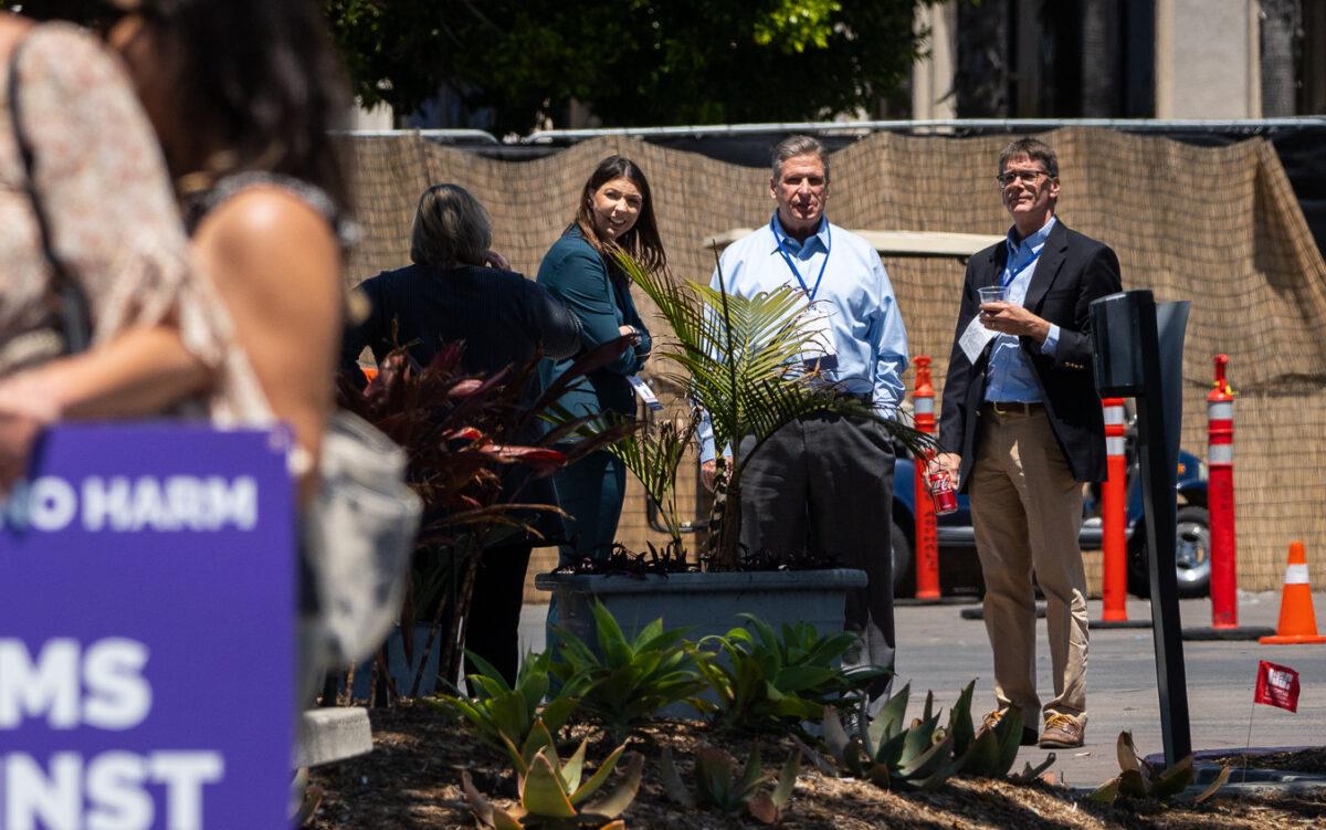 Medical professionals attending the annual Pediatric Endocrine Society conference listen to detransition advocates in San Diego, Calif., on May 6, 2023. (John Fredricks/The Epoch Times)