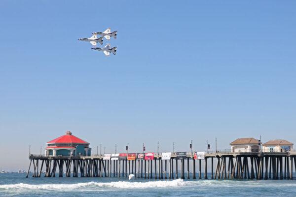 The United States Air Force Thunderbirds fly over the Huntington Beach Pier during the Pacific Airshow in Huntington Beach, Calif., on Oct. 1, 2021. (Michael Heiman/Getty Images)