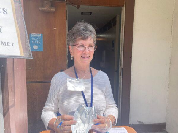 Homeless program co-founder Gail Mutke at her post at St. Luke’s Episcopal Church in Long Beach, Calif., on May 13, 2023. (Carol Cassis/The Epoch Times)