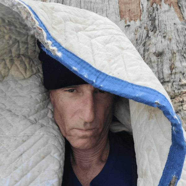 John Alle is seen in a recent photo disguised as a homeless person in Santa Monica, Calif. (Courtesy of John Alle)