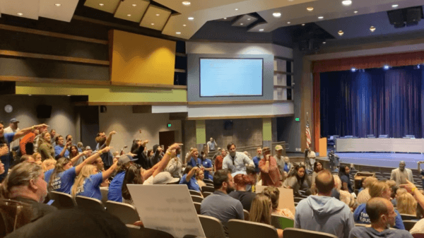 Attendees react to the Temecula Valley Unified School Board's decision to terminate the district’s superintendent amid controversy surrounding critical race theory and school curriculum during a board meeting in Temecula, Calif., on June 13, 2023. (Micaela Ricaforte/The Epoch Times)