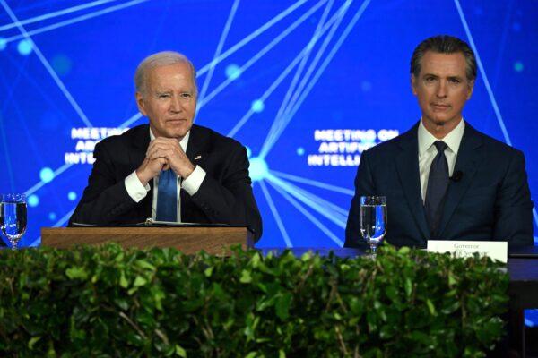 President Joe Biden (L) and California Gov. Gavin Newsom take part in an event discussing the opportunities and risks of artificial intelligence at the Fairmont Hotel in San Francisco on June 20, 2023. (Andrew Caballero-Reynolds/AFP via Getty Images)