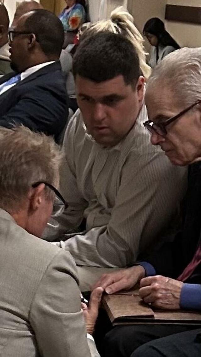 Henry Kuhn (C) appears at Riverside County Superior Court to enter his plea in Riverside, Calif., on March 30, 2023. (Courtesy of Randy Economy)