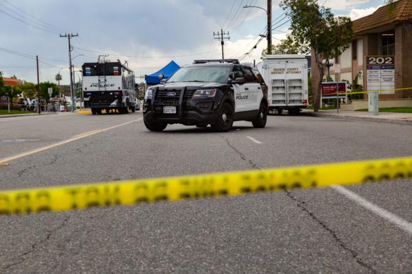 Police investigate the scene of a crime in Orange, Calif., on April 1, 2021. (John Fredricks/The Epoch Times)