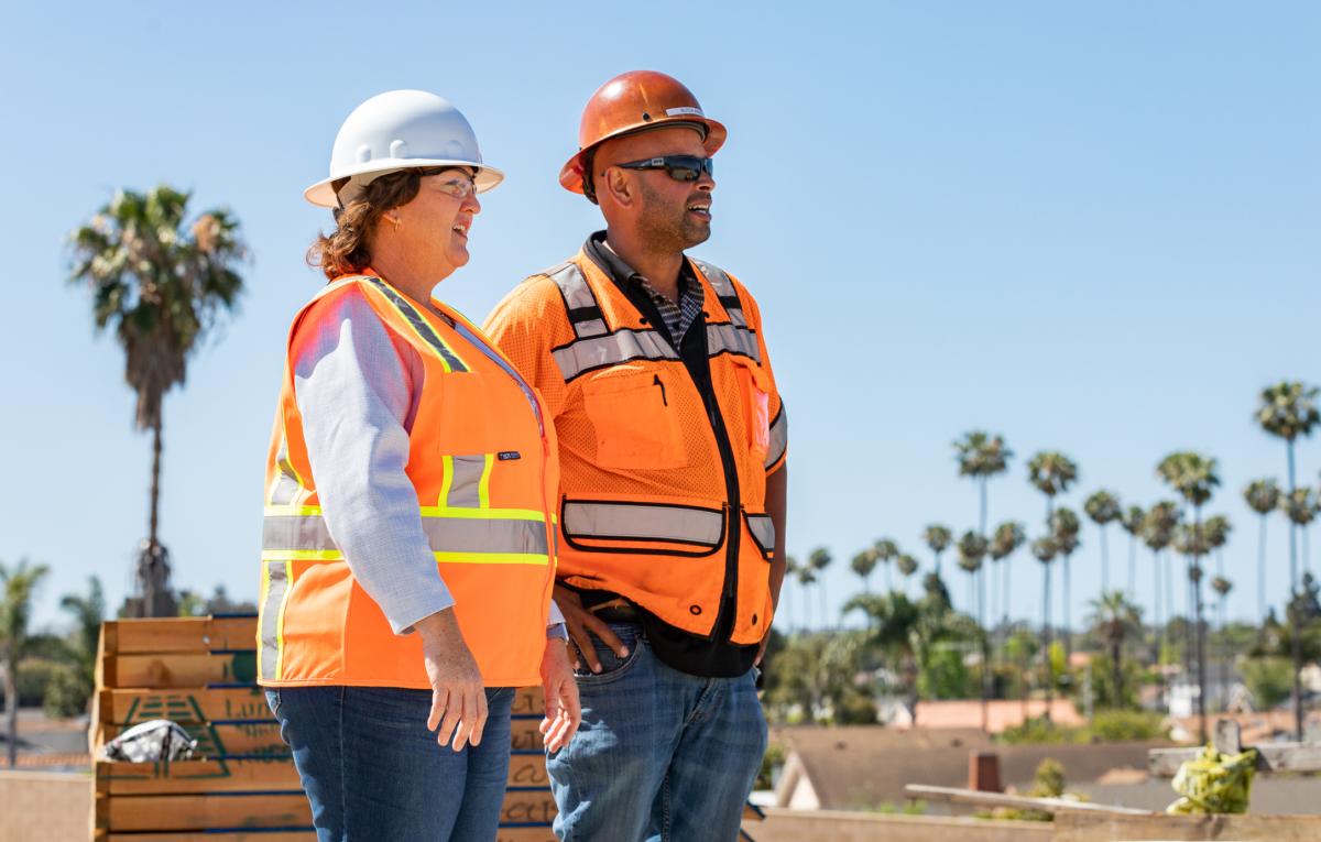 Rep. Katie Porter (D-Irvine) looks over construction on a State Route 73 interchange from the 405 Freeway in Costa Mesa, Calif., on April 21, 2022. (John Fredricks/The Epoch Times)