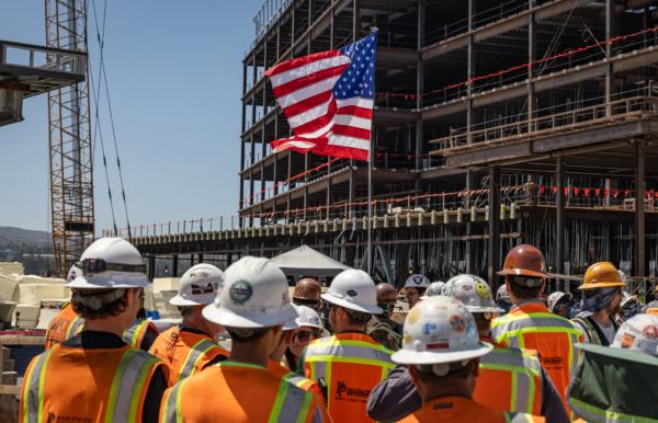Construction crew work to complete a new medical facility at the University of California–Irvine in Irvine, Calif., on July 13, 2023. (John Fredricks/The Epoch Times)