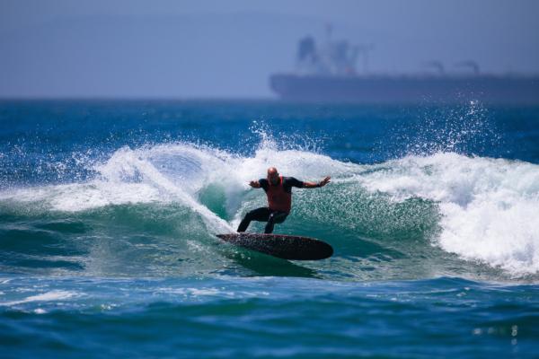 Taylor Jensen of the United States surfs in the Finals at the VANS Duct Tape Invitational in Huntington Beach, Calif., on Aug. 7, 2022. (Beatriz Ryder/World Surf League)