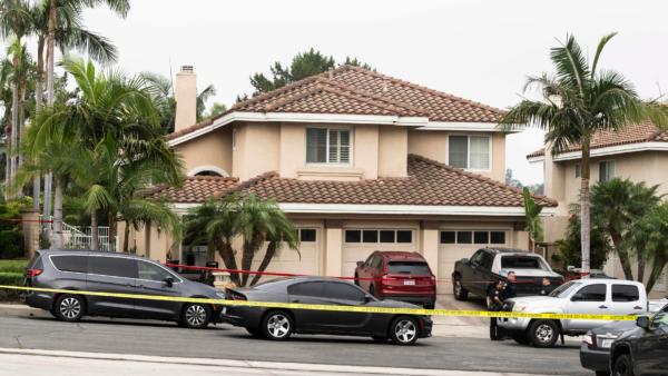 Officials investigate a shooting at a house in the 8500 block of E. Canyon Vista Dr. in Anaheim, Calif., on Aug. 4, 2023. (Paul Bersebach/The Orange County Register via AP)