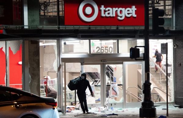 A looter robs a Target store in Oakland, Calif., on May 30, 2020. (Josh Edelson/AFP via Getty Images)