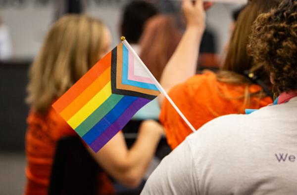 An LGBT flag at an Orange Unified School District meeting in Orange, Calif., on Aug. 17, 2023. (John Fredricks/The Epoch Times)
