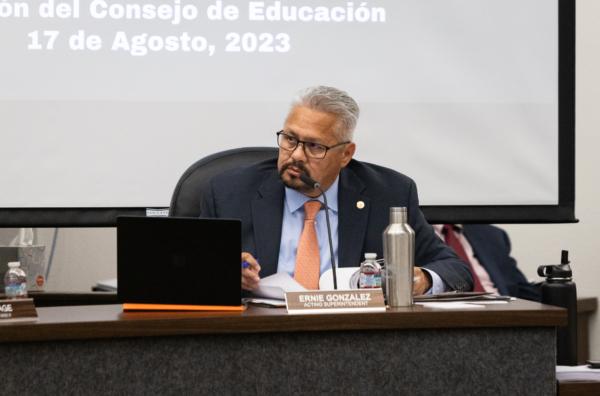 Orange Unified School District Superintendent Ernie Gonzalez prepares for an Orange Unified School District board meeting in Orange, Calif., on Aug. 17, 2023. (John Fredricks/The Epoch Times)