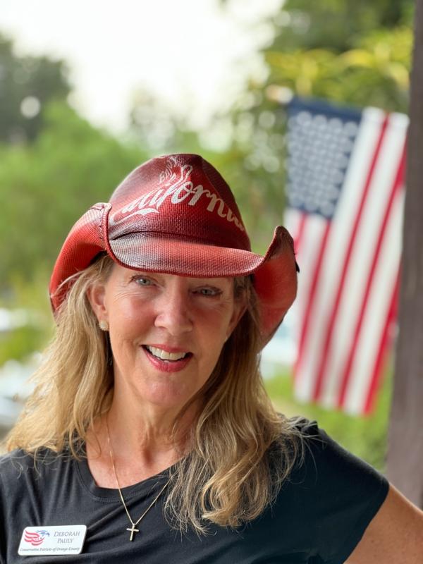 Deborah Pauly, president of Conservative Patriots of Orange County, organizes a private event for supporters of former Trump attorney John Eastman at a ranch in northern Orange County, Calif., on Aug. 19, 2023. (Brad Jones/The Epoch Times)