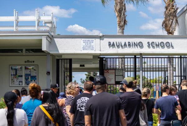Parents pick up their children at Paularino Elementary School, of the Newport-Mesa Unified School District, in Costa Mesa, Calif., on Aug. 21, 2023. (John Fredricks/The Epoch Times)