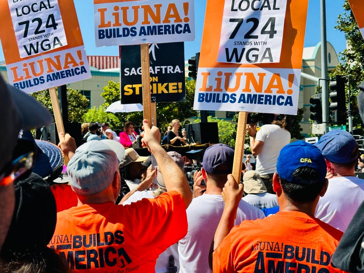 Hollywood writers and actors hold a union rally outside Disney Studios in Burbank, Calif., on Aug. 22, 2023. The “National Day of Solidarity” rally drew an estimated 2,000 people supporting the ongoing strikes against major studios. (Jill McLaughlin/The Epoch Times)