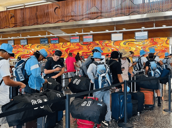 The Villa Park High School football team waiting at the airport before returning to California after its season-opening trip to Hawaii, on Aug. 12, 2023. (Courtesy of Dusan Ancich via Instagram/Screenshot via The Epoch Times)