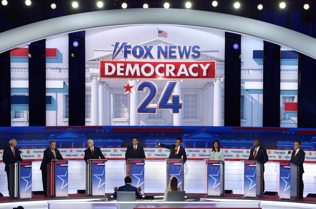 Republican presidential candidates (L–R), former Arkansas Gov. Asa Hutchinson, former New Jersey Gov. Chris Christie, former Vice President Mike Pence, Florida Gov. Ron DeSantis, Vivek Ramaswamy, former U.N. Ambassador Nikki Haley, Sen. Tim Scott (R-S.C.), and North Dakota Gov. Doug Burgum participate in the first debate of the GOP primary season hosted by FOX News at the Fiserv Forum in Milwaukee, Wis., on Aug. 23, 2023. (Win McNamee/Getty Images)