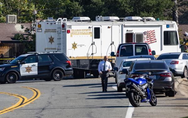 Law enforcement officers investigate the crime scene of a mass shooting at Cooks Corner restaurant in Trabuco Canyon, Calif., on Aug. 24, 2023. (John Fredricks/The Epoch Times)