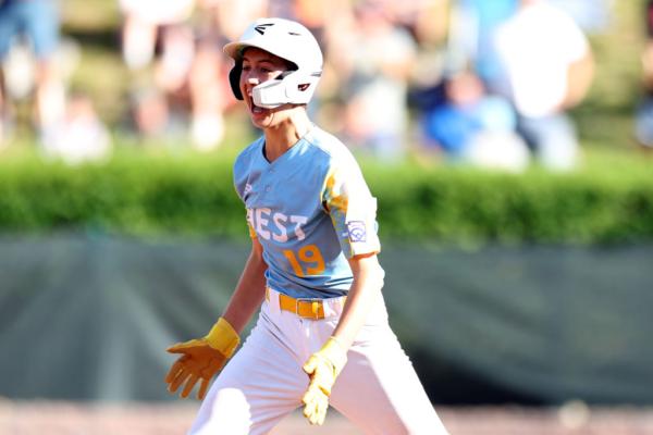 Louis Lappe (19) of the West Region team from El Segundo, Calif., rounds bases after hitting a walk-off home run to defeat the Caribbean Region team from Willemstad, Curacao during the Little League World Series Championship Game at Little League International Complex in South Williamsport, Pa., on Aug. 27, 2023. (Tim Nwachukwu/Getty Images)