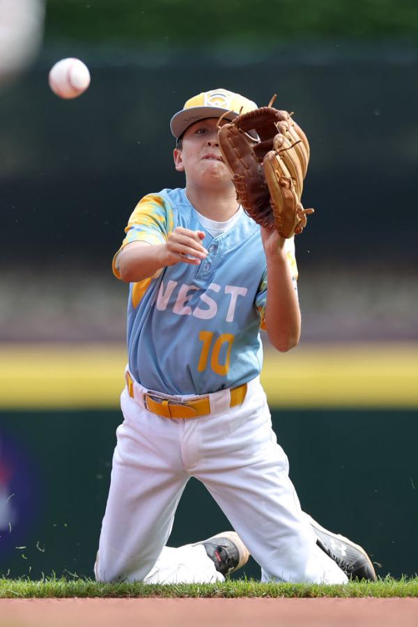 Colby Lee (10) of the West Region team from El Segundo, California fields a ground ball during the first inning against the Southwest Region team from Needville, Texas during the Little League World Series United States Championship at Little League International Complex in South Williamsport, Pa., on Aug. 27, 2023. (Tim Nwachukwu/Getty Images)